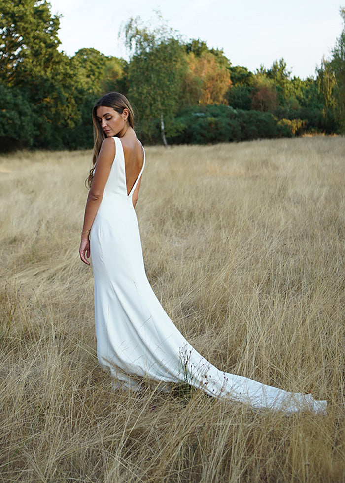Best Wedding designers created this elegant simple fit and flare wedding dress for romantic  weddings