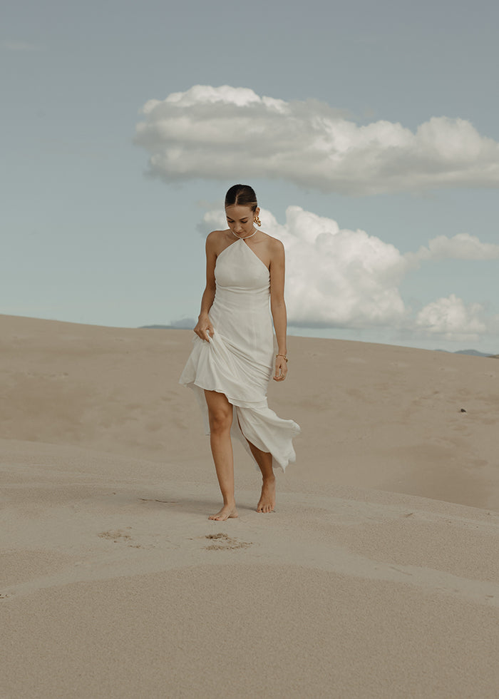 
                  
                    MODEL WEARS Clean Stretch Crepe Fit and Flare Halterneck Wedding Dress
                  
                