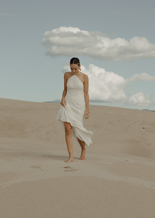 MODEL WEARS Clean Stretch Crepe Fit and Flare Halterneck Wedding Dress