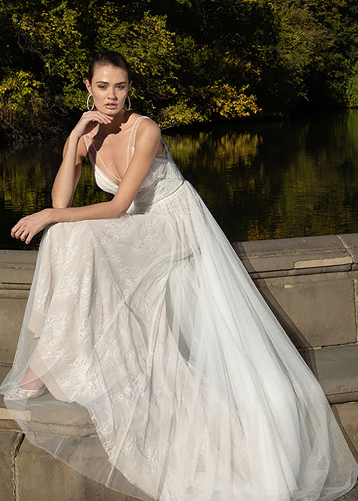 model wears luxury wedding dress by best wedding designers in London