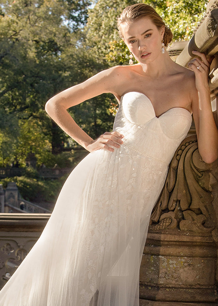 Ivory beaded lace gown with bustier tulle and 3D floral wedding dress