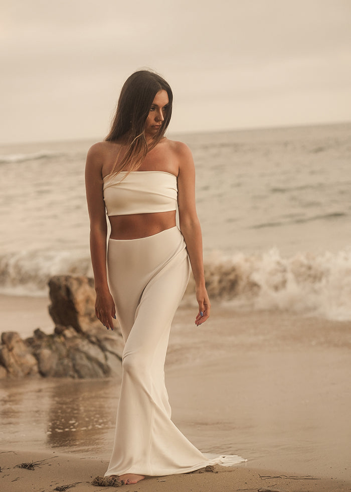 Bride wears fluted crepe bridal skirt to complete her bridal outfit look for summer wedding