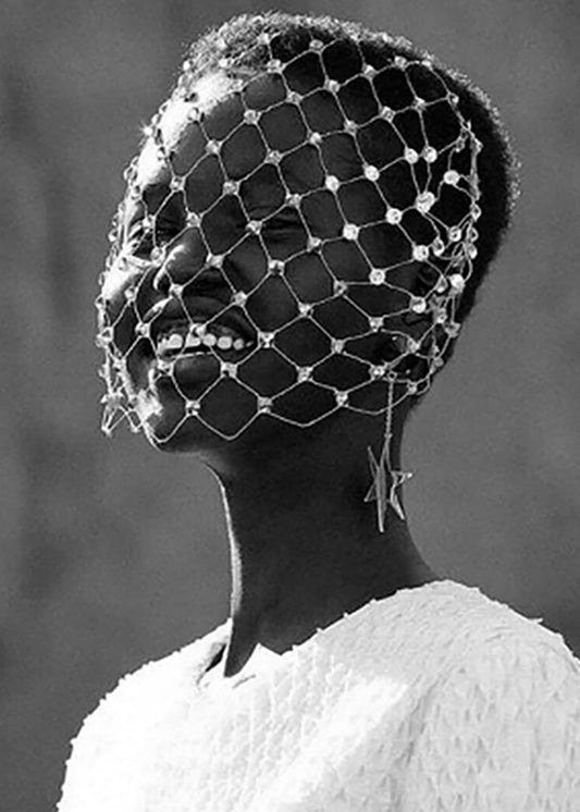 ilsmodel wears Swarovski Crystal encrusted delicate English cage veil with wide diamond pattern netting , wedding veils